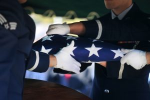 airmen-folded-flag-600x400